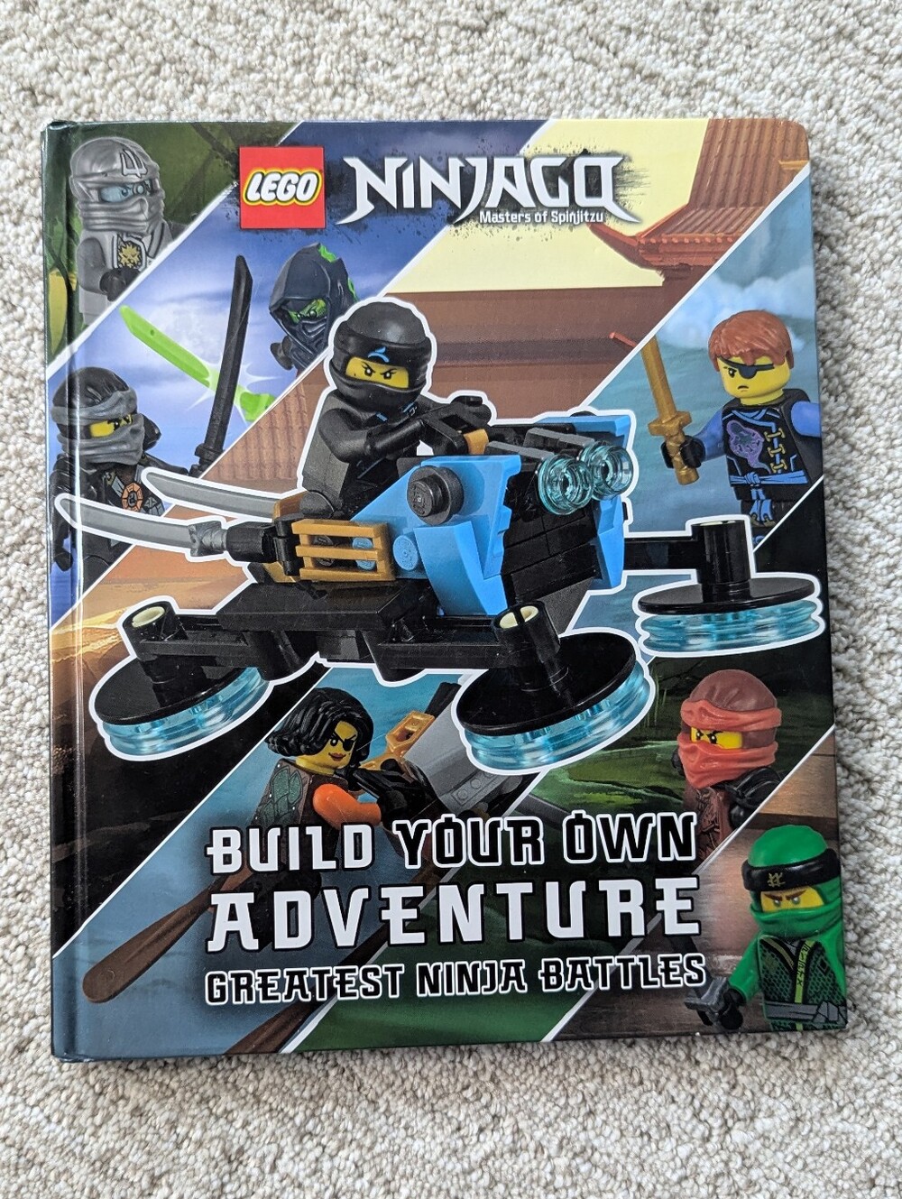 ​"LEGO Ninjago: Build Your Own Adventure - Greatest Ninja Battles" (Hardcover Bo